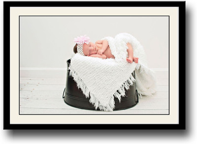 

Baby sleeping on black bucket Fine Art Print(10 inch X 14 inch, Framed)