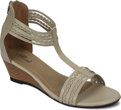 

Flora Women White Wedges
