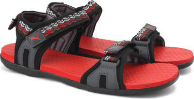 

Puma Men Puma Black-Asphalt-High Risk Red Sports Sandals