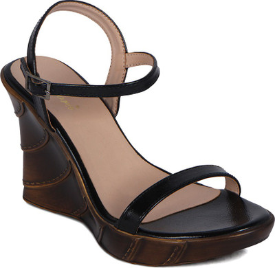 

Flora Women Black Wedges
