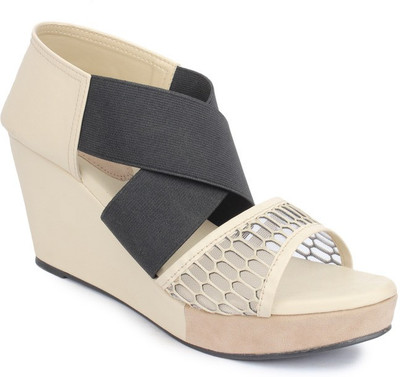 

Sindhi Footwear Women Beige Wedges