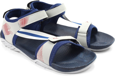 

Puma Men sodalite blue-gray violet-high risk red Sports Sandals