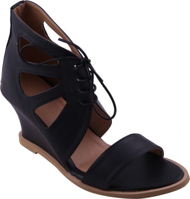 

Adorn Women Black Wedges