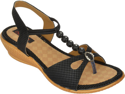 

Exotique Women Black Wedges