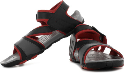 

Puma Men black-high risk red-dark shado Sports Sandals