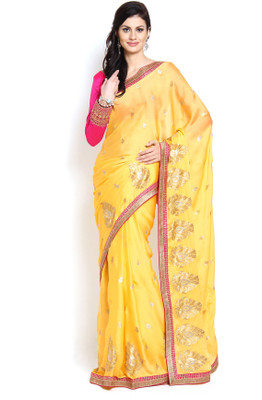 

Soch Self Design, Solid Fashion Crepe Saree(Yellow, Gold)