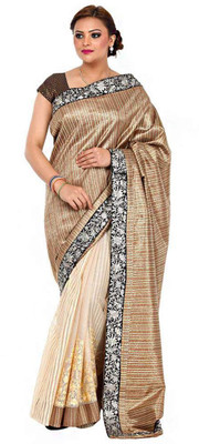 

Kataan Bazaar Self Design Banarasi Handloom Net Saree(Brown)