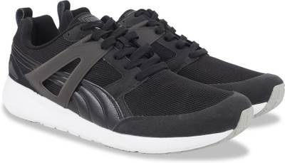 

Puma Aril Sneakers For Men(Black, Black-white