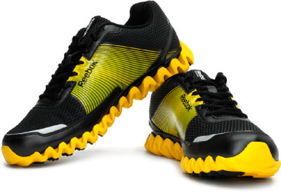 

REEBOK Zignano Burn LP Running Shoes For Men(Yellow, Black, Black;blaze yellow;white