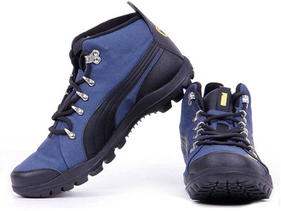

Puma SilicisMid HC DP Outdoors Shoes For Men(Blue, Peacoat-black-dandelion