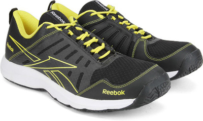 

REEBOK REAL ACTIVE LP Men Running Shoes For Men(Black, White, Yellow), Black/radar yellow/white