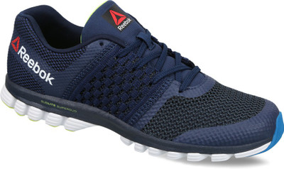 

REEBOK SUBLITE TRANISITION Running Shoes For Men(Black, Coll navy/neon yllw/whit