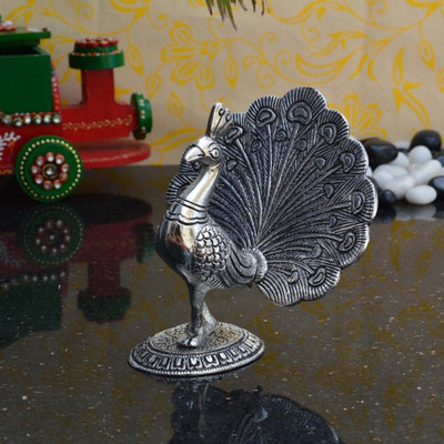 60% OFF on eCraftIndia Dancing Peocock Decorative Showpiece - 15.24 cm(Aluminium, Silver) 60% OFF on eCraftIndia Dancing Peocock Decorative Showpiece - 15.24 cm(Aluminium, Silver)