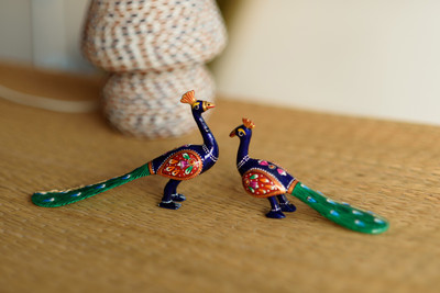 

eCraftIndia Set of 2 Coloful Meenakari Sitting Peacocks Figurine Decorative Showpiece - 11 cm(Aluminium, Green, Blue, Red)
