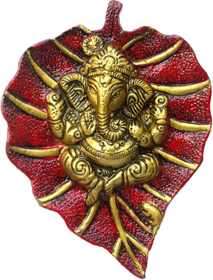 

DivineCrafts Metal Wall Hanging Of Lord Ganesha On Leaf Decorative Showpiece - 18 cm(Aluminium, Red)