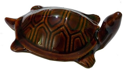 

CraftEra Decorative Showpiece - 7 cm(Porcelain, Brown)