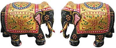 

Chitra Handicraft Elephant Decorative Showpiece - 7 cm(Wooden, Multicolor)