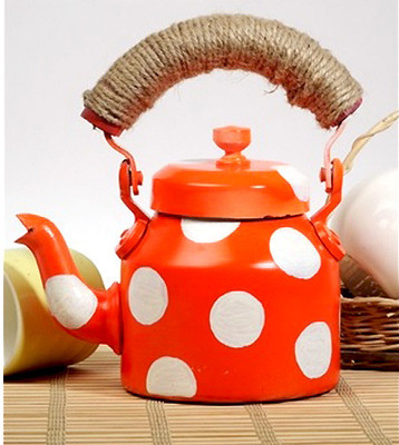 60% OFF on Use Me Orange Polkalicious Showpiece - 15 cm(Aluminium, Orange)