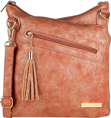 

Lino Perros Women Orange Leatherette Sling Bag