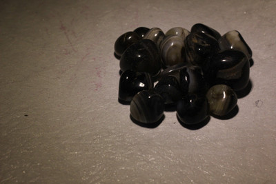 

Pebblewala PBLWLA021 Polished Asymmetrical Onyx Pebbles(Black 980 g)