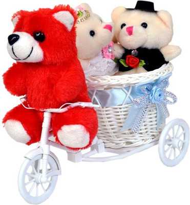 

Pingaksh Crafty Collection Cute Wedding Teddy Couple on Cycle Driven by Pretty Red Teddy - 17 cm(White)