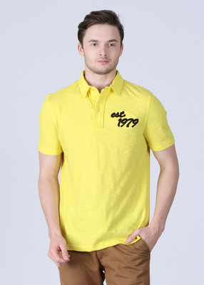 

REEBOK Solid Men's Polo Neck Yellow T-Shirt, Sun rock s12
