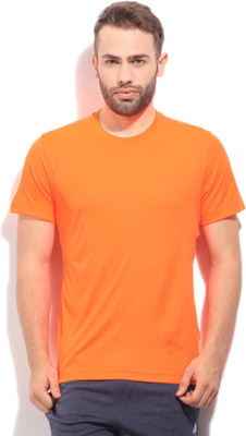 

REEBOK Solid Men's Round Neck Orange T-Shirt, �elepea