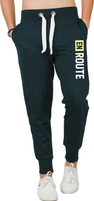 

Bewakoof Solid Men's Green Track Pants