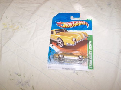 

Hot Wheels 2011 Studebaker Avanti Treasure Hunt 5 Of 15(Yellow)