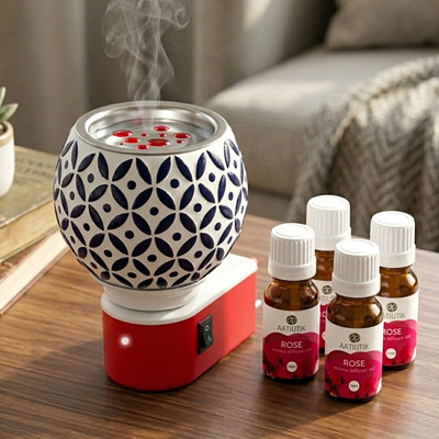 Aatiutik Rose Fragrance Air Freshener Diffuser Set Electric Kapoor Dani Camphor Diffuser with 4 Aroma Oils | Ceramic Essential Oil Burner Night Lamp Light | Plug-in Fragrance Diffuser for Home, Office, Meditation, Pooja Room & Aromatherapy(4 x 10 ml)