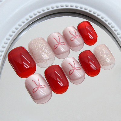 NAKHI 24 Artificial Fake Nail Set | Base Peach with Maroon Bow Design Glossy Nails Maroon(Pack of 24)