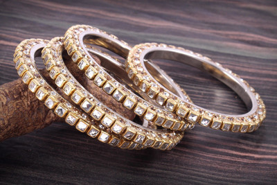 Alzawiah Alloy Cubic Zirconia Gold-plated Bangle Set(Pack of 4)