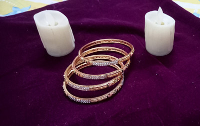 Krishna Collections Alloy Cubic Zirconia Gold-plated Bangle Set(Pack of 4)