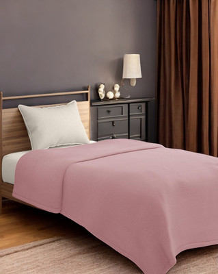 The Home Talk Solid Single Fleece Blanket for  AC Room(Polyester, Pink)