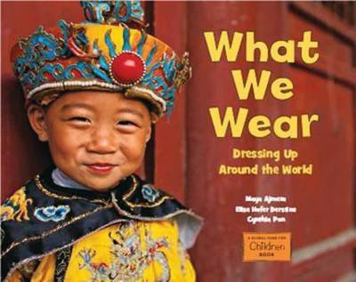 What We Wear(English, Paperback, Ajmera Maya)