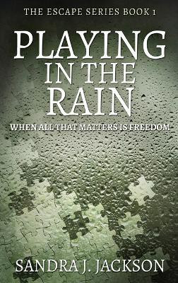 Playing In The Rain(English, Hardcover, Jackson Sandra J)