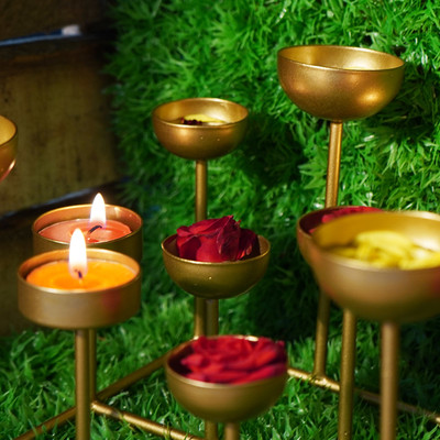 Puja N Pujari Golden Color Multi Tea Light Holder with Mini urlis Iron 21 - Cup Tealight Holder Set(Gold, Pack of 1)