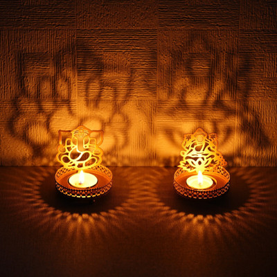 eCraftIndia Set Of 2 Golden Metal Lord Ganesha And Goddess Lakshmi Shadow Tea Light Holders Iron Tealight Holder(Gold, Pack of 2)