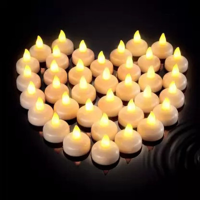 SIDDIVINAYAK CREATION Floating Tealight Water Sensor Battery Operated Led Candles for Home Décor Candle(Yellow, Pack of 12)