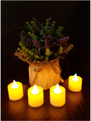 AFTERSTITCH Melting wax candle style Artificial T light led candles for dinner and home decoration ( Batteries Included) wax style Set of 4 Candle(Yellow, Pack of 4)