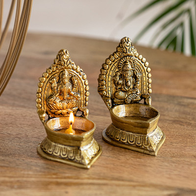 ExclusiveLane Handcarved 'Laxmi Ganesha Pair' Hand-Etched, 20 ml Brass (Pack of 2) Table Diya Set(Height: 4.2 inch)