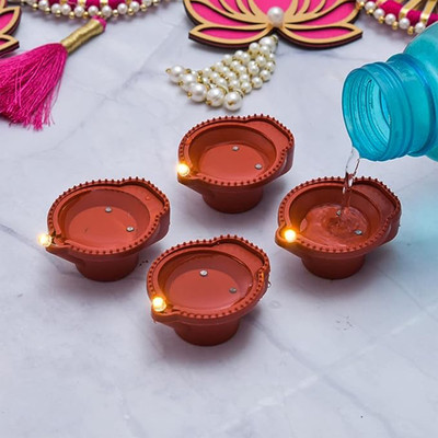 The Shine Store Water Sensor LED Light Diya Decorative Diya Set Battery Operated Plastic (Pack of 6) Table Diya Set(Height: 0.5 inch)