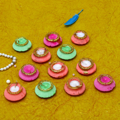 Togline TOGLINE MULTICOLOR WITH GLITTER PRINTED WAX MATKA DIYA Earthenware (Pack of 12) Table Diya Set(Height: 1.3 inch)