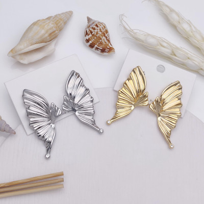 Navinyajewels Golden Butterfly Wing 0Earrings – Bold, Elegant, Eye-Catching | Every Occas Cubic Zirconia Copper Stud Earring