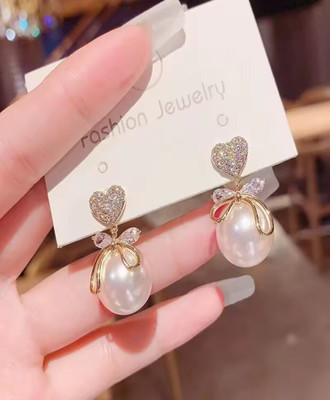 Vembley Vembley fashion big pearl earrings female temperament elegant Bow earrings Metal Jhumki Earring
