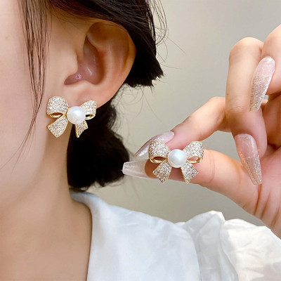 MAHADEV CREATION Golden White Pearl Bow Earring Crystal Alloy Stud Earring