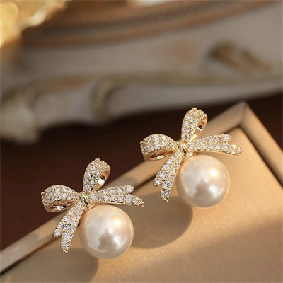 Jassa Korean Gold-Plated Bow Shaped CZ Pearl Stud Earrings For Women & Girls Pearl, Diamond, Cubic Zirconia Alloy Stud Earring