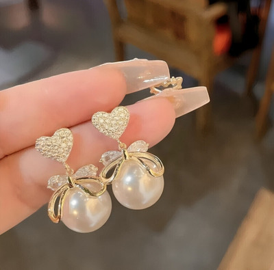 Jualiva Premium Gold-Plated CZ Diamond Bow Shaped Pearl Drop Earrings For Girls & Women Diamond, Cubic Zirconia, Pearl Alloy Drops & Danglers
