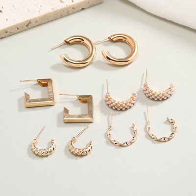 Vembley Combo of 9 Pair Gold Plated Triangle Pearl Stud And Twisted Hoop Earrings Alloy Earring Set