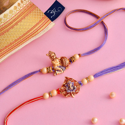 HyperFoods Designer DORE Rakhi For Brother Balgopal & Ganesha on Leaf Rakhi Set of 2 Assorted Rakhi  Set(contains: Set of 2 Balgopal & Ganesha on Leaf Rakhi with 1 Roli & Chawal pack.)